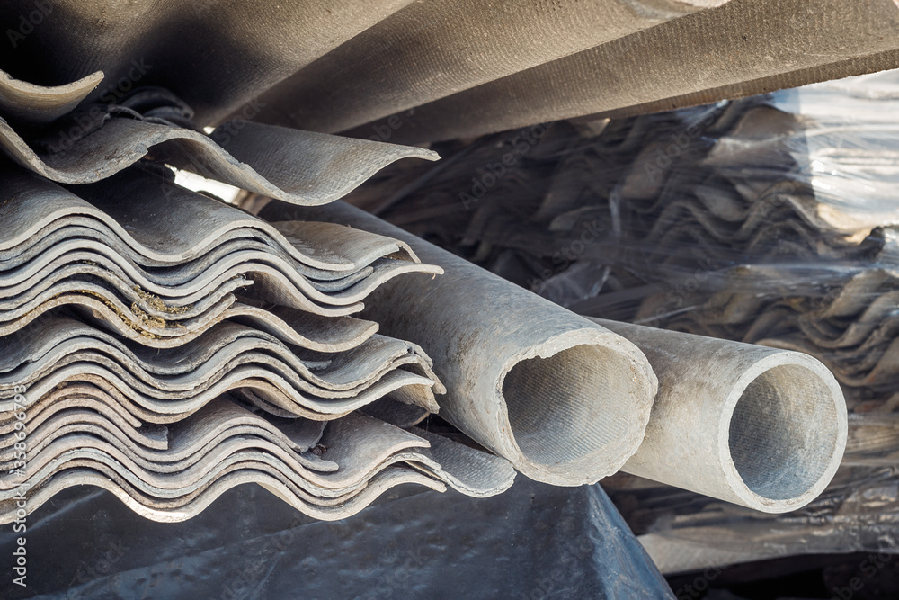Asbestos landfill . Roof covering material with asbestos fiber