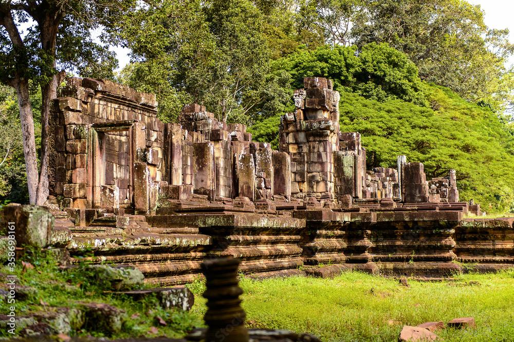 It's Baphuon, a temple at Angkor, Cambodia. Built as the state temple of Udayadityavarman II dedicated to the Hindu God Shiva.