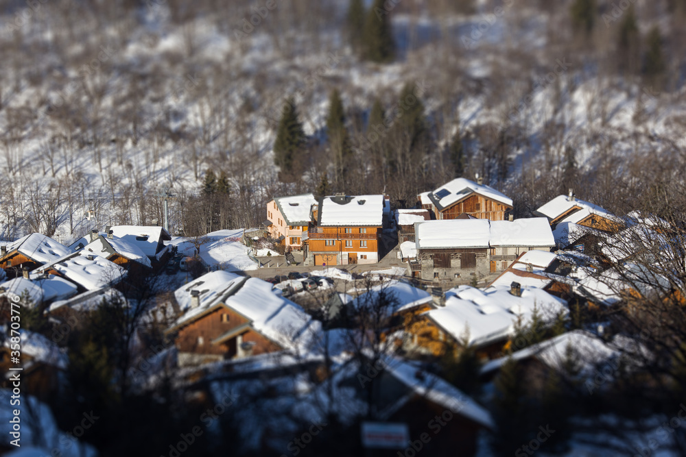 Panoramic view of the mountains of France on a winter sunny day. Haute Savoy, France. Snow Park. Tilt shift effect.