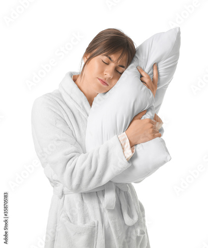 Tired woman with pillow on ...