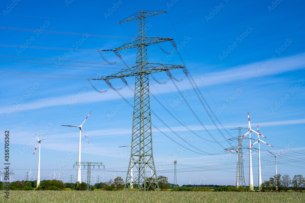 Overhead power lines and wind turbines seen in Germany Overhead power lines and wind turbines seen in Germany