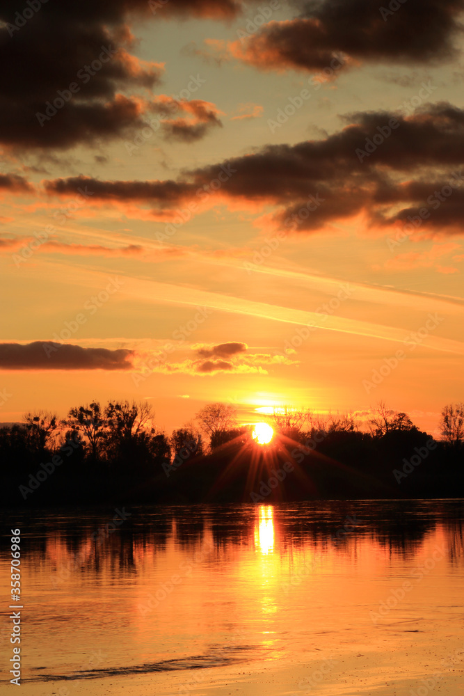 Colorful sunset by the Odra River, Poland.