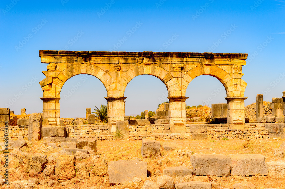 It's Ruins of Volubilis, an excavated Berber and Roman city in Morocco, ancient capital of the kingdom of Mauretania. UNESCO World Heritage