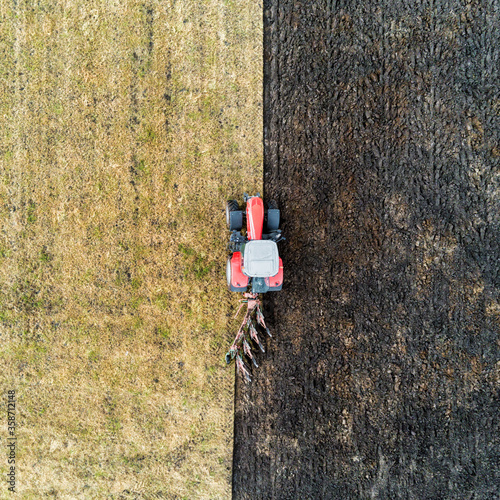 Tractor plowing a field