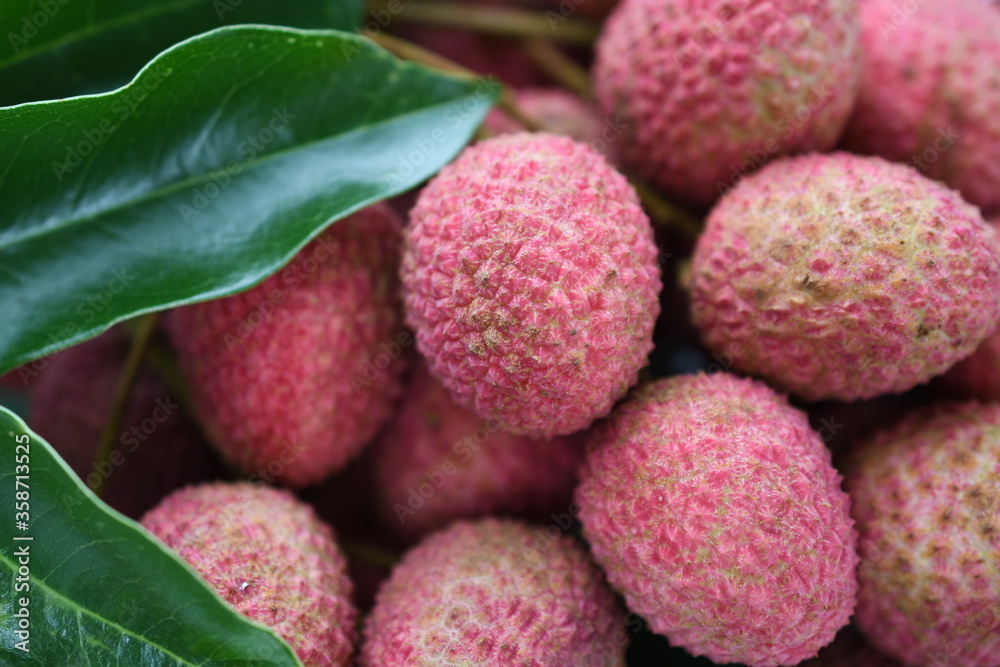 lychee on a wooden table lychee on a wooden table
