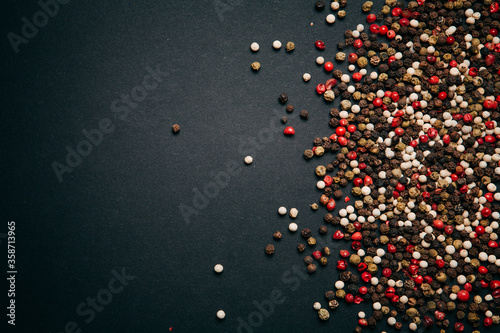 Collection of peppercorn in black background