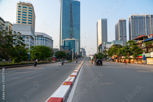 Hanoi cityscape with modern buildings on Nguyen Chi Thanh street at late evening