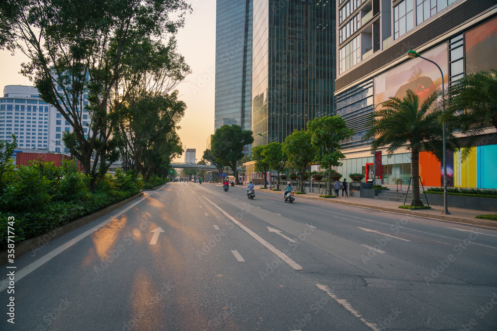 Hanoi cityscape with modern buildings on Kim Ma street at sunset Hanoi cityscape with modern buildings on Kim Ma street at sunset