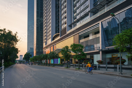 Hanoi cityscape with modern buildings on Kim Ma street at sunset