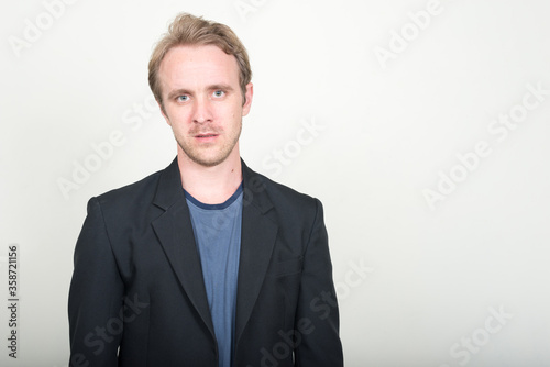 Face of handsome businessman with blond hair © Ranta Images