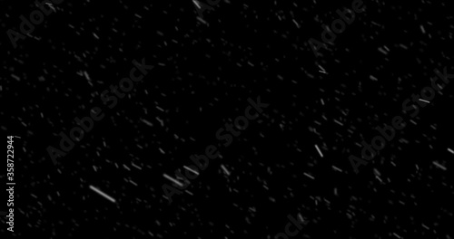Turbulent snowfall as winter season weather background. 4k loop. Alpha channel included.