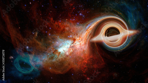 Fototapeta Naklejka Na Ścianę i Meble -  Black Hole Garagantua Interstellar. Elements of this image furnished by NASA