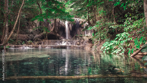 Deep forest waterfall at Mata Jitu Waterfall In Moyo Island, Sumbawa, Indonesia photo