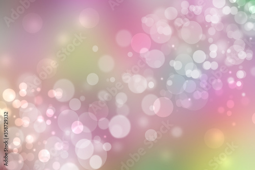 Abstract blurred fresh vivid spring summer light delicate pastel yellow pink orange green bokeh background texture with bright circular soft color lights. Beautiful backdrop illustration.