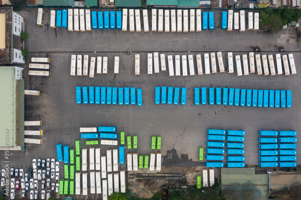 Aerial view of city buses in the parking lot at the bus station Aerial view of city buses in the parking lot at the bus station