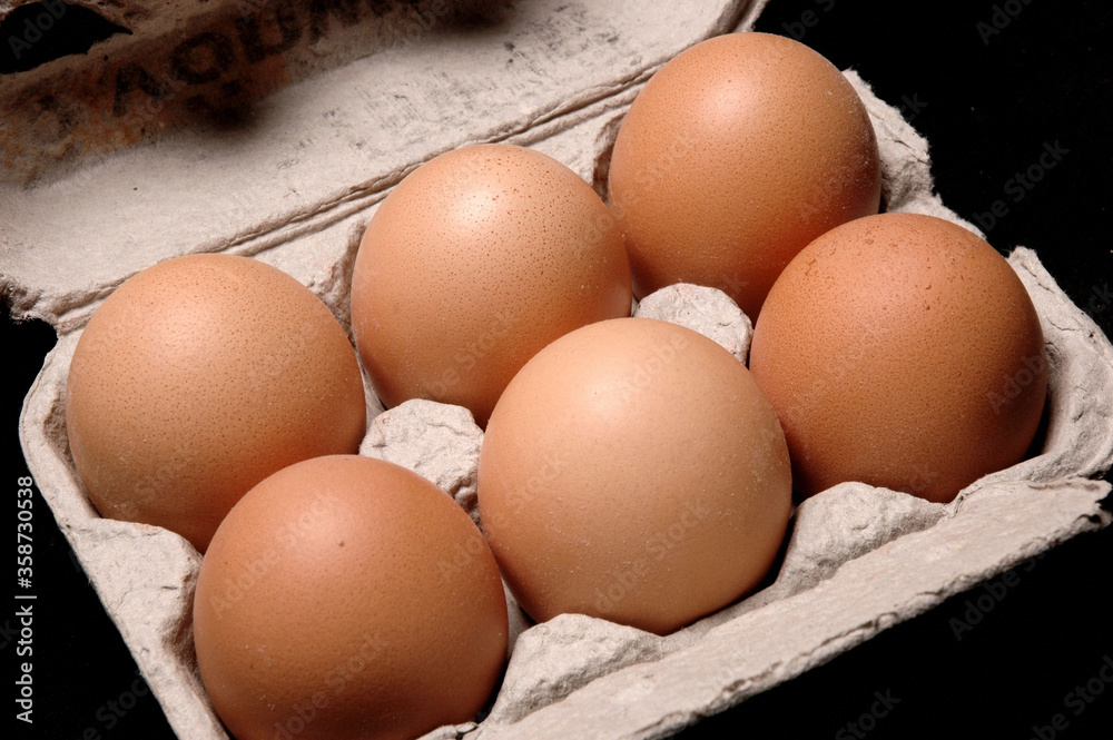Egg Carton, Close Up against black background. Egg Carton, Close Up against black background.