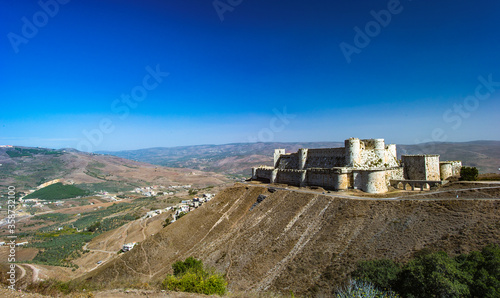 Obraz w ramie It's Krak des Chevaliers, also Crac des Chevaliers, is a Crusader castle in Syria and one of the most important preserved medieval castles in the world.