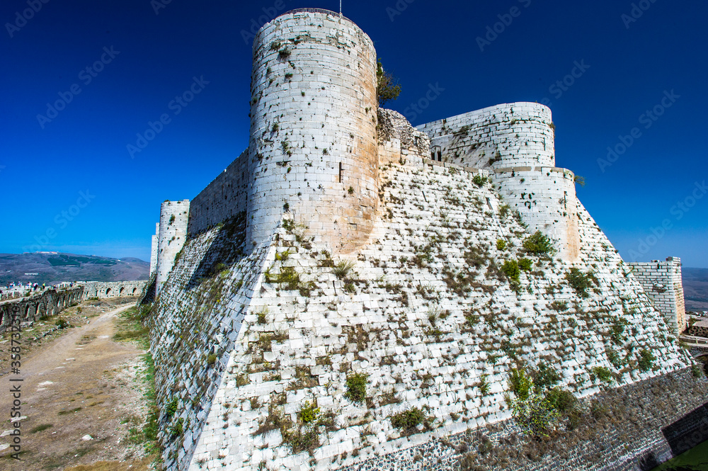 It's Part of the Krak des Chevaliers, a Crusader castle in Syria - obrazy, fototapety, plakaty 