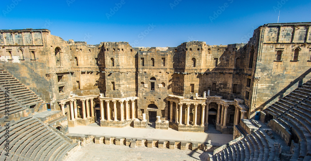 It's The 2nd century Roman theater, constructed probably under Trajan. Ancient City of Bosra, UNESCO World Heritage,