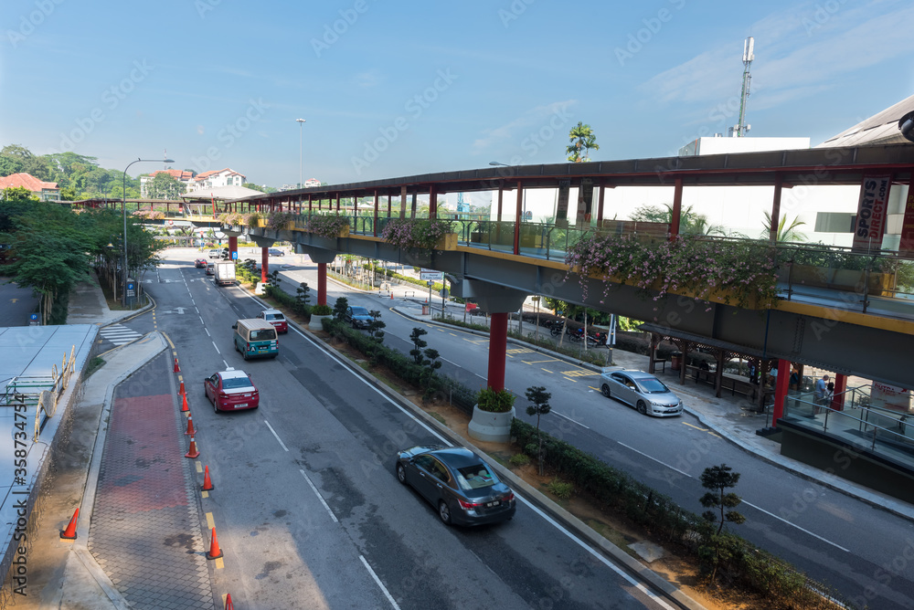 Kuala Lumpur, Federal Territory / Malaysia - February 15, 2017: Overhead pedestrian walking bridge adjacent to Sunway Putra Mall and Seri Pacific Hotel leads to nearby facilities.