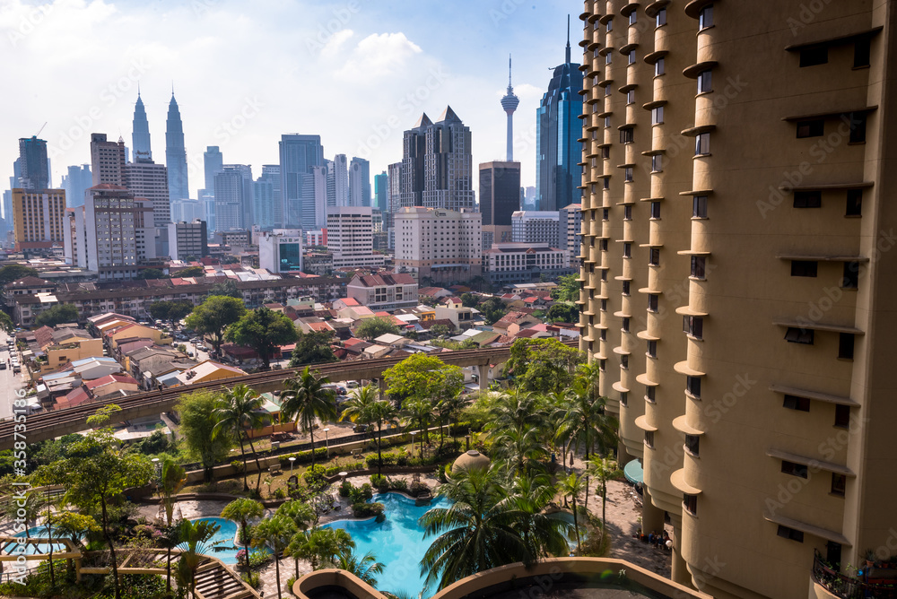 Fototapeta premium Kuala Lumpur, Federal Territory / Malaysia - February 15, 2017: Kuala Lumpur skyline, Chow Kit area and Villa Puteri Condominium is visible from the Sunway Putra Hotel on day time.
