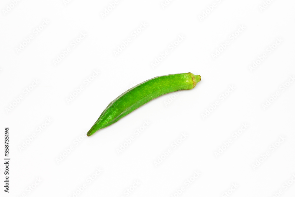 Isolated.Okra, Lady’s finger, Gombo, Gumbo, Bendee, Quimbamto's seed on the white background. Isolated.Okra, Lady’s finger, Gombo, Gumbo, Bendee, Quimbamto's seed on the white background.