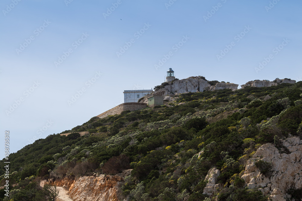 Lighthouse on a rock, Sardinia, Italy