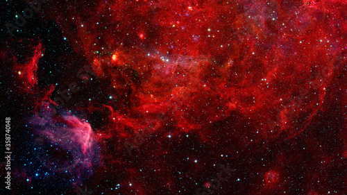 Red nebula in space. Elements of this image furnished by NASA