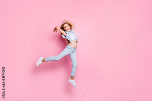 Full length body size view of her she nice attractive lovely pretty carefree glad cheerful cheery preteen girl jumping having fun holiday vacation leisure isolated on pink pastel color background