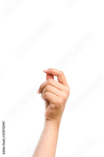  a hand holding something like a bottle or smartphone on white backgrounds, isolated