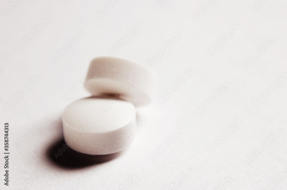 Stacked Pills, Close Up on white background . Stacked Pills, Close Up on white background .