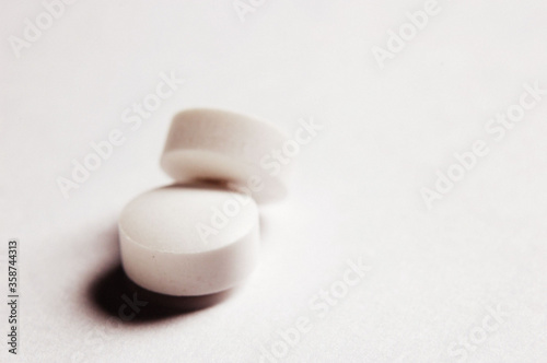 Stacked Pills, Close Up on white background .