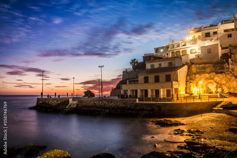 Obraz premium La Caleta-Guardia fishermen neighborhood at dusk in Salobreña, province of Granada, Andalusia, Spain