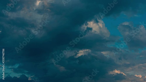 Timelapse of dark Clouds forming against blue sky, cloudscape time lapse motion.