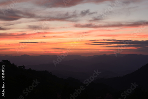 Amazing twilight over the mountain at Doi Inthanond national park. Chiang Mai, Thailand. © BunphotPhairoh