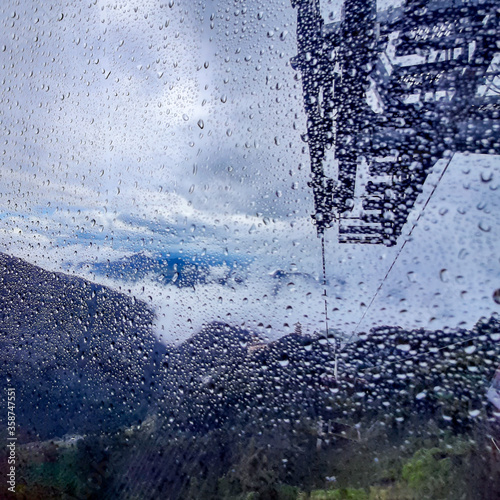 View of cable car to Genting highland with the water dropped on the glass in Kuala Lumpur Malaysia photo