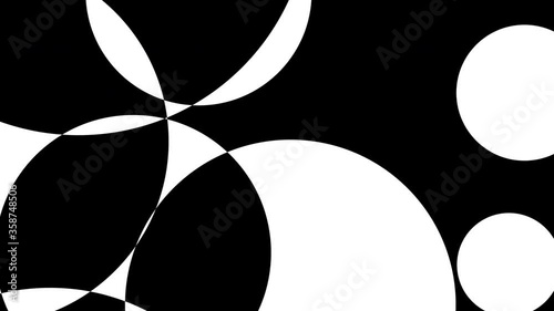 Abstract looped geometric background with black and white interacting circles