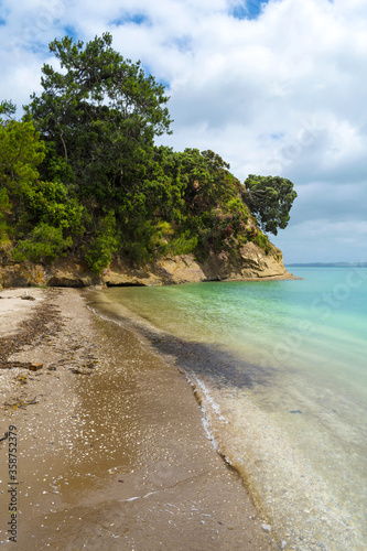 Headland and Panoramic View of Eastern Beach, Auckland New Zealand during High Tide Time