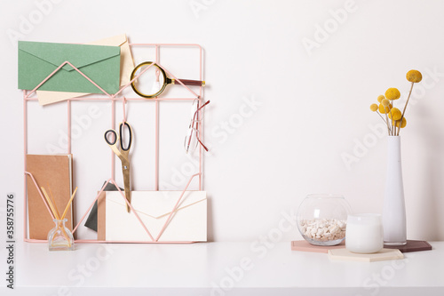 Modern office desk with colorful accessories. Empty space, mock up. Minimal style.