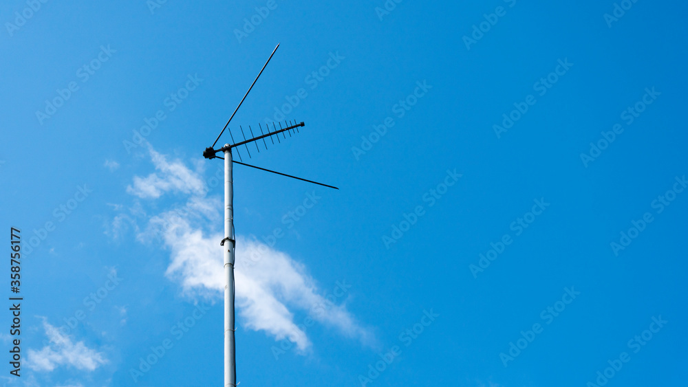 television antenna against the sky television antenna against the sky