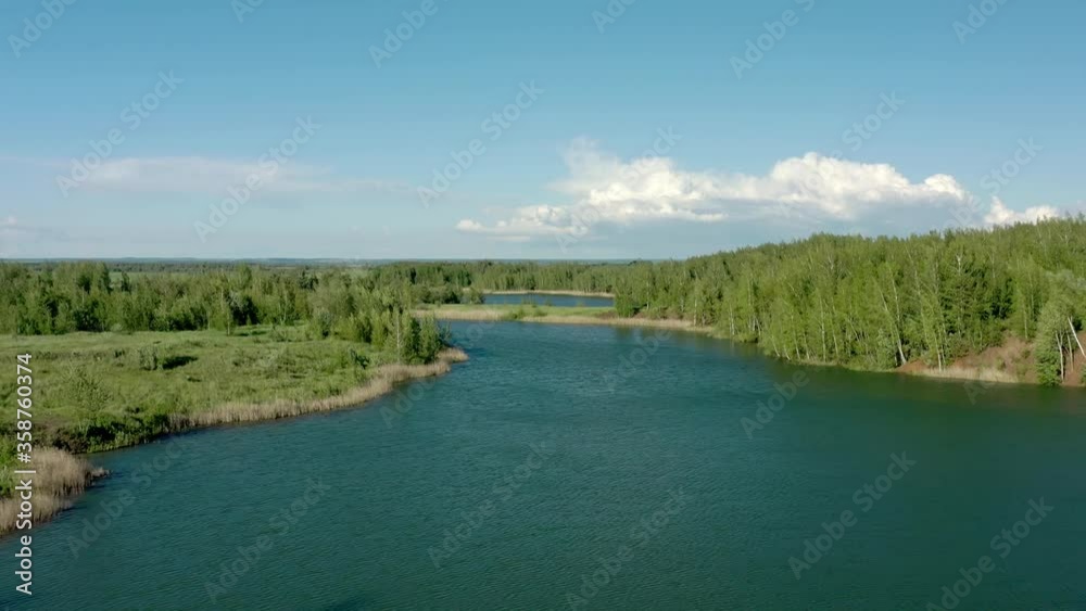 Tula oblast romantsevo hills and lakes drone aerial shot. High quality 4k footage fly over tulskaya oblast romantsevskie hills, konduki shot under cloudy blue sky Tula oblast romantsevo hills and lakes drone aerial shot. High quality 4k footage fly over tulskaya oblast romantsevskie hills, konduki shot under cloudy blue sky