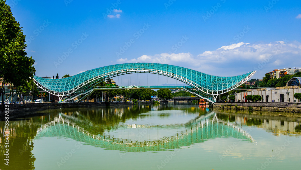 It's Bridge of Peace in Tbilisi, Geaorgia, bow-shaped pedestrian bridge over the Kura River in Tbilisi, capital of Georgia. One of the most important sites of Tbilisi