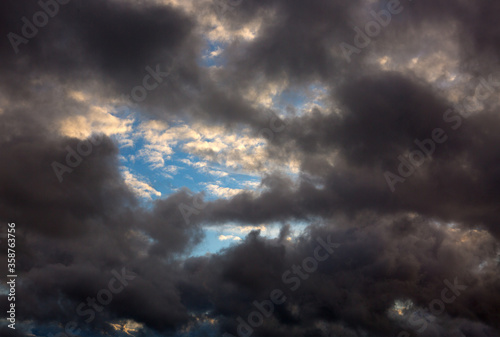 Nature gray sky background with big clouds.