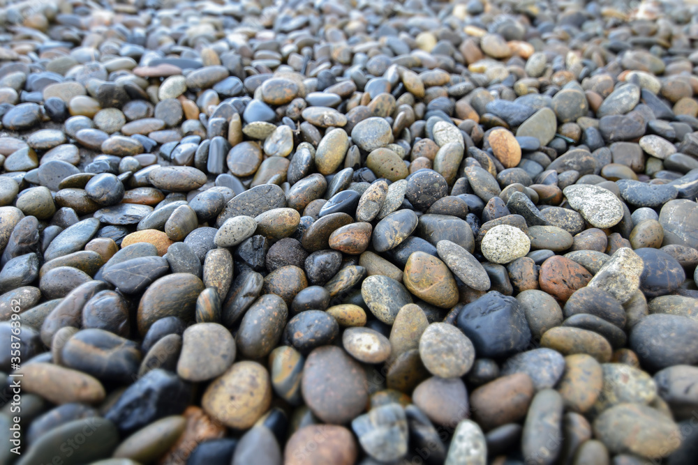 small stones, sea pebbles, texture and background small stones, sea pebbles, texture and background