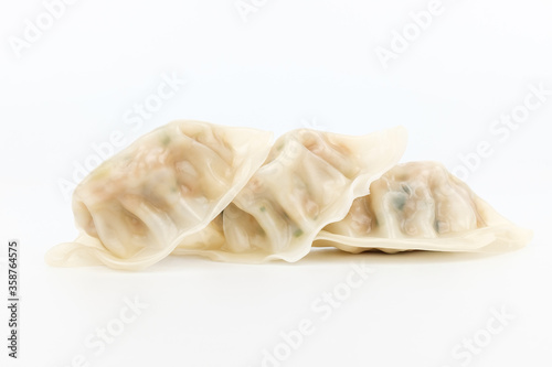 Steamed dumpling on white background