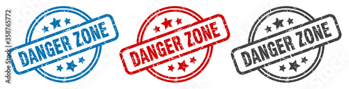 danger zone stamp. danger zone round isolated sign. danger zone label set