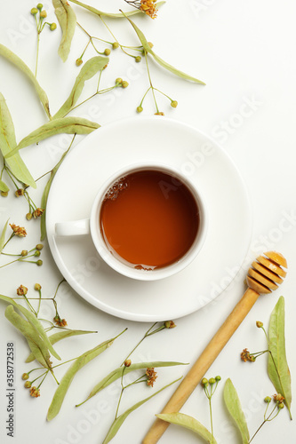 Composition with linden tea on white background, top view. Natural tea