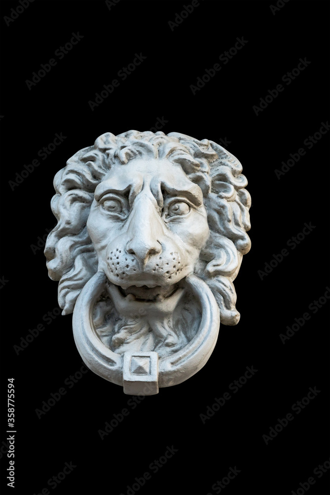 gypsum sculpture lion head to decorate the facade of the building isolated on a black background