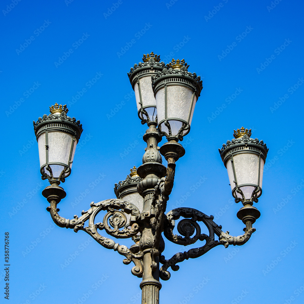 It's Lamp post on the Plaza Mayor, Madrid, Spain. It's the Spanish Property of Cultural Interest