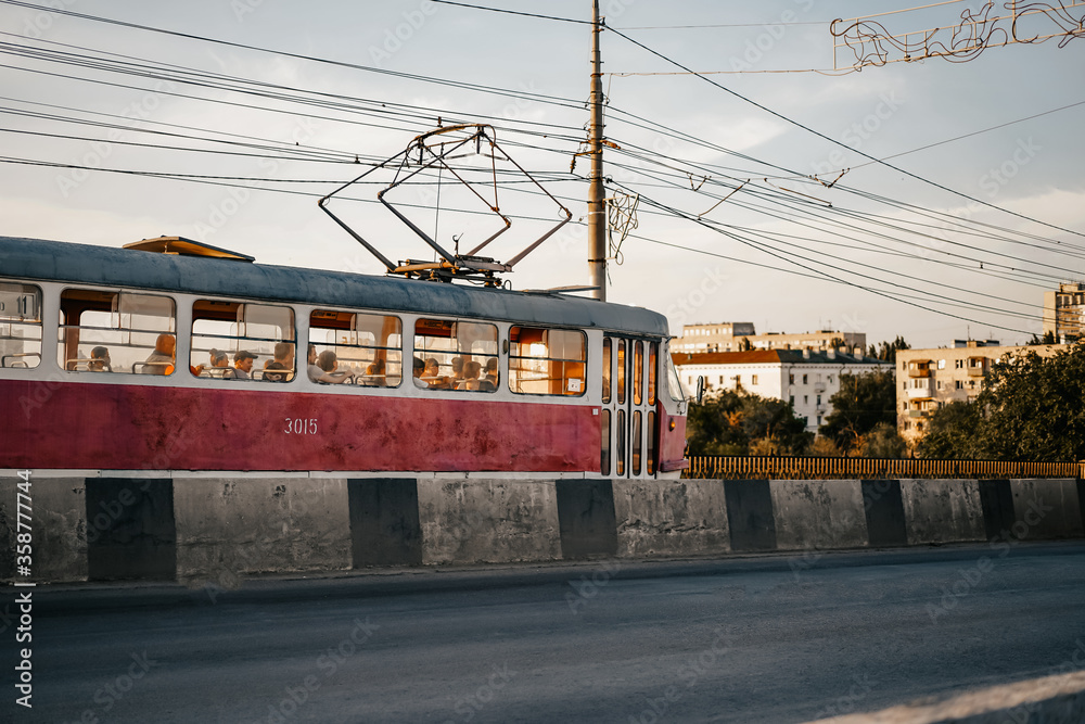 Red retro tram in Volgograd during the epidemic of the coronavirus